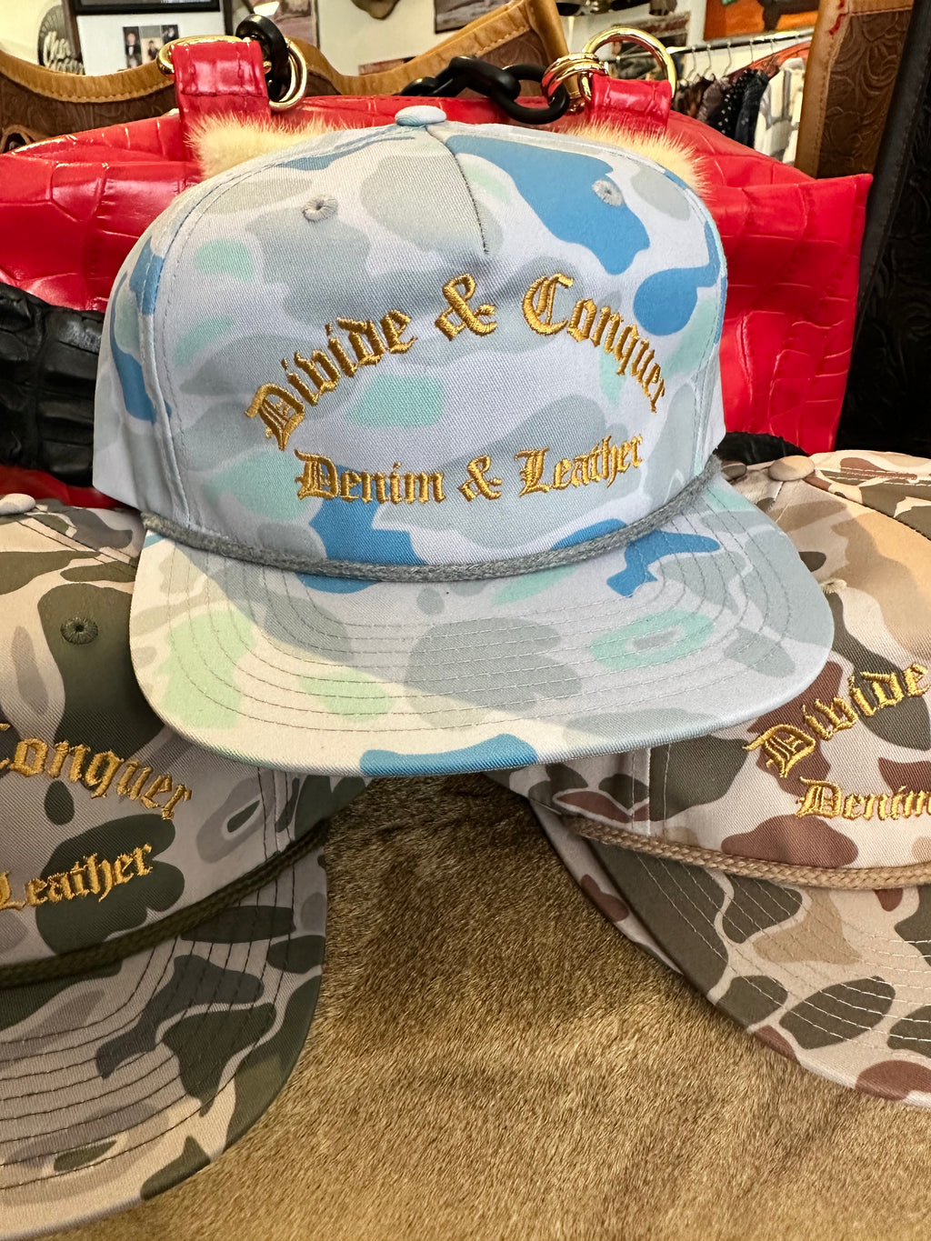 Co. Camo hat blue with gold font