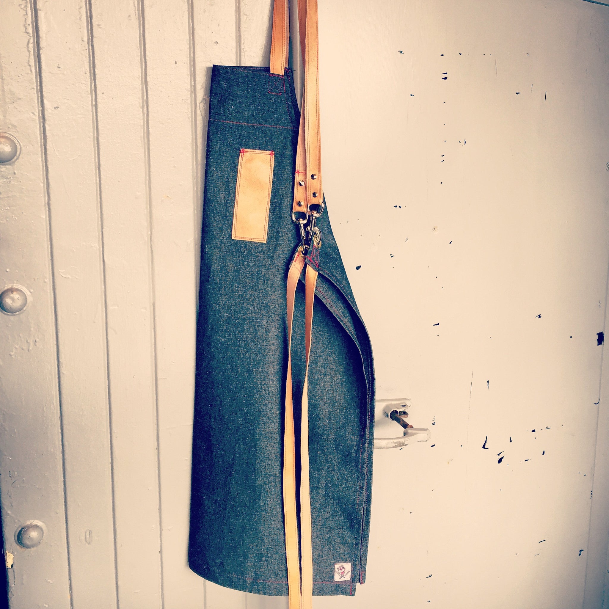 denim and leather crossback apron