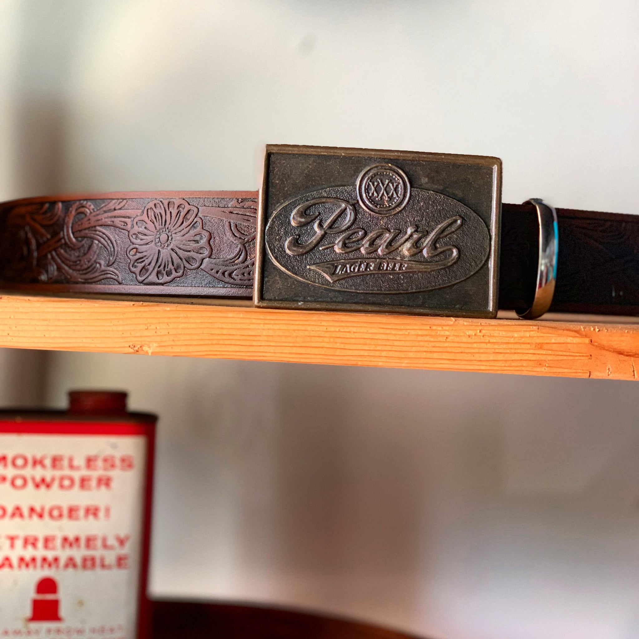 Vintage brass Pearl Beer with embossed flowers leather belt