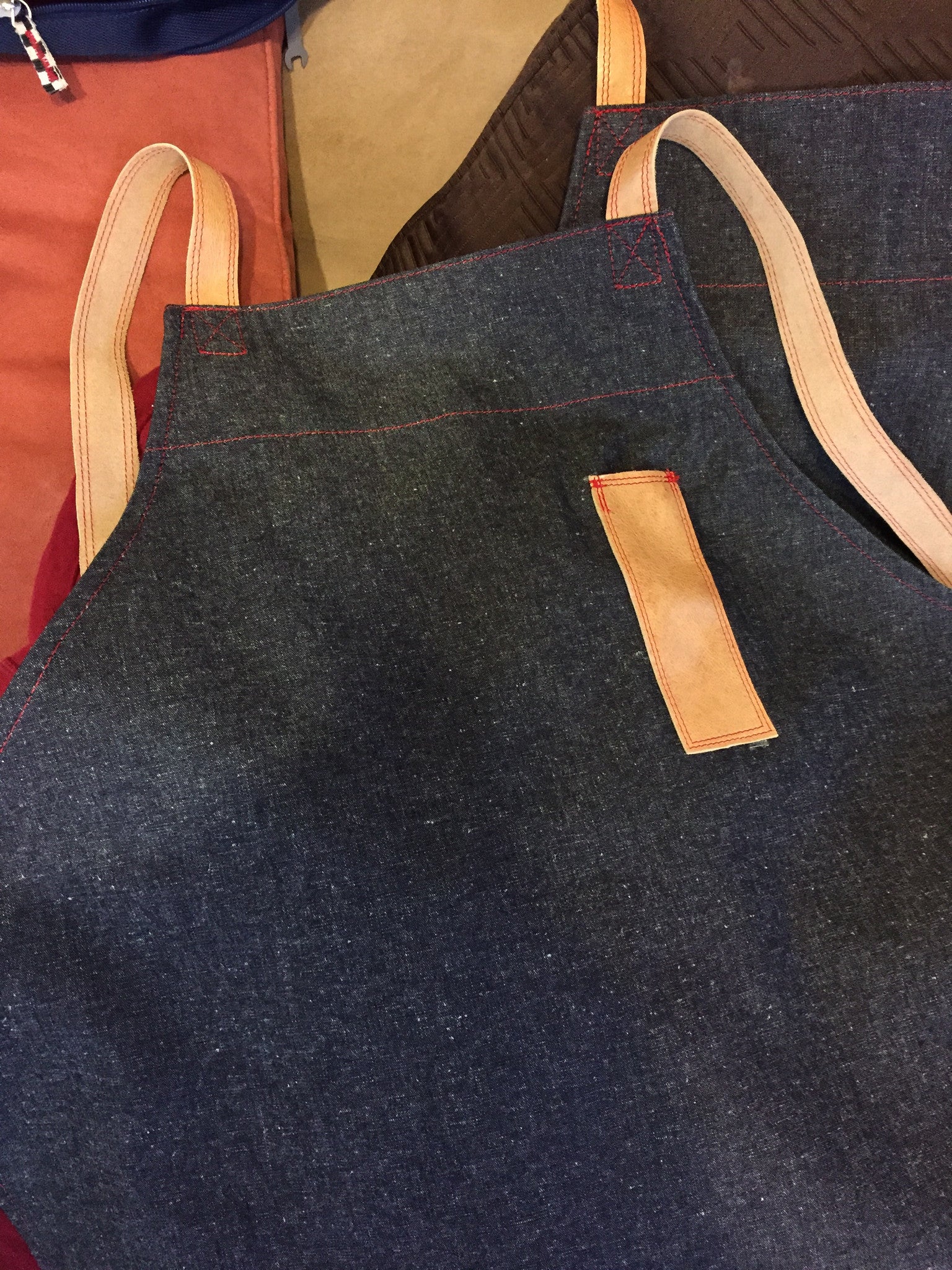 denim and leather crossback apron
